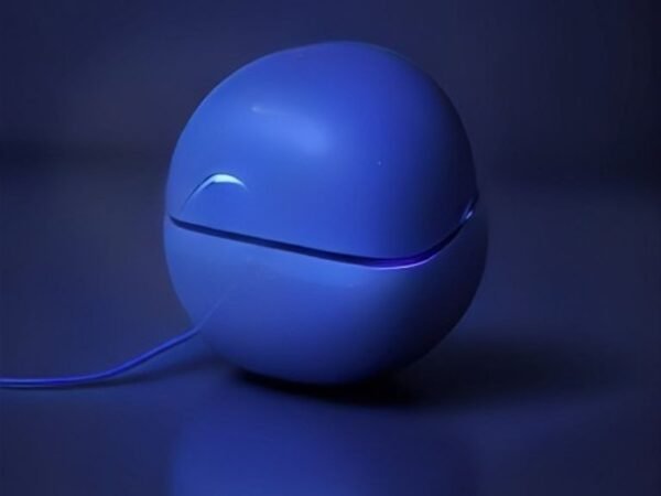 Modern wireless earbuds resting on a dark surface with subtle glowing soundwave patterns representing smart noise-cancelling technology.