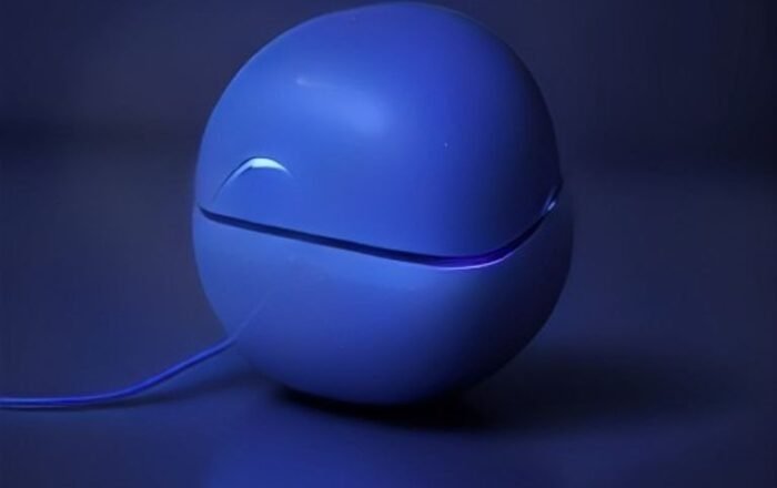 Modern wireless earbuds resting on a dark surface with subtle glowing soundwave patterns representing smart noise-cancelling technology.